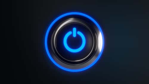 Glowing blue power button on a dark background
