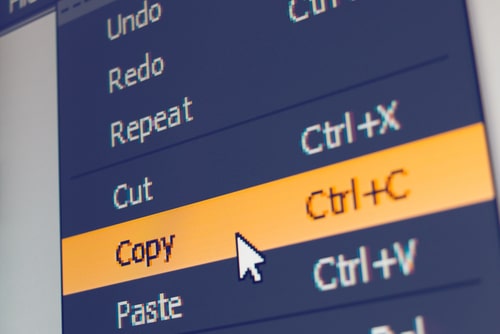 Computer screen showing a context menu with the "Copy" option highlighted and a cursor pointing at it