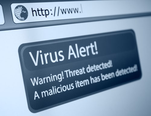 Computer screen showing a virus alert warning about a detected malicious item