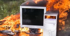 Computer tower and monitor on fire