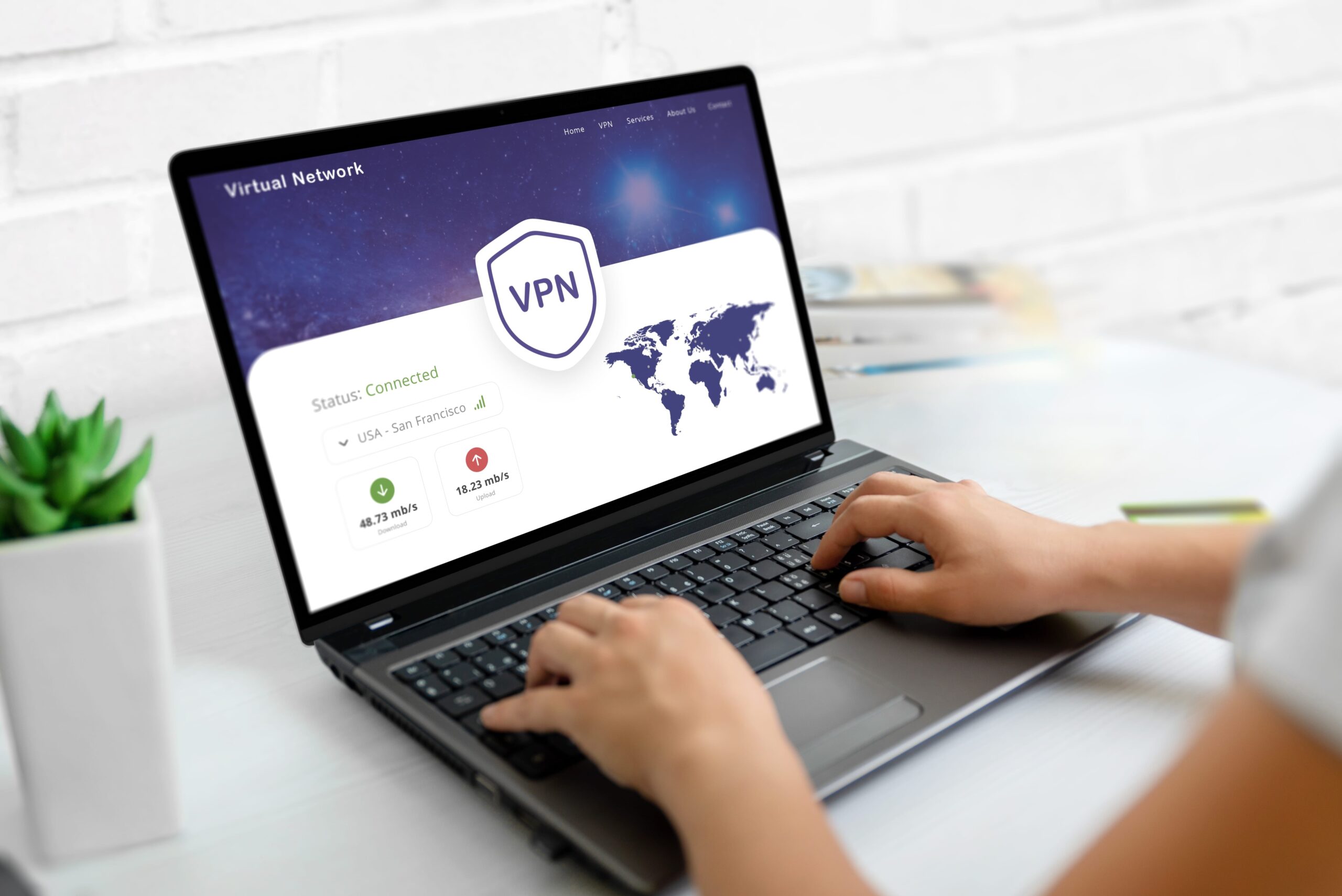 Individual on laptop using a VPN
