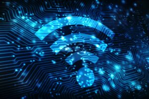 Wi-Fi symbol under a blue circuit board. 