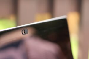 Close-up of a laptop webcam with a privacy cover slider, symbolizing online privacy and webcam security. 