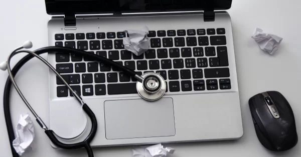 laptop with stethoscope