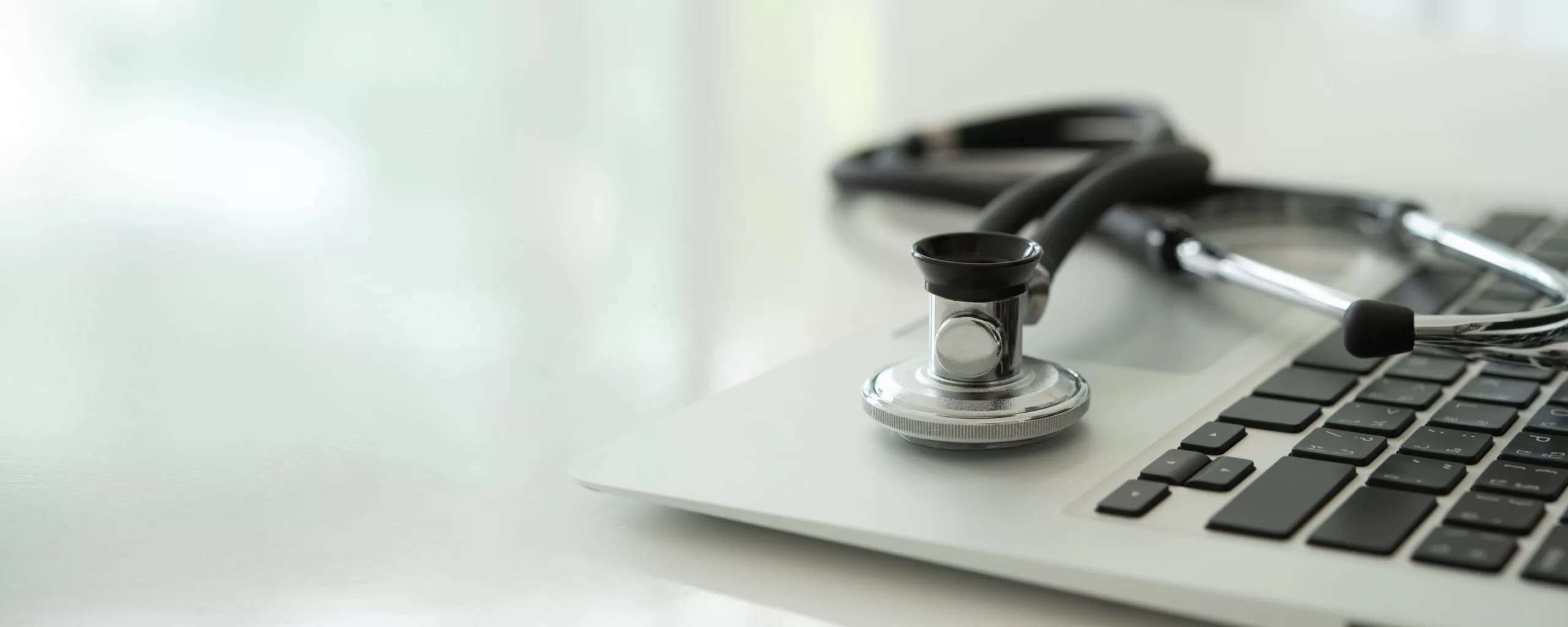 laptop with stethoscope