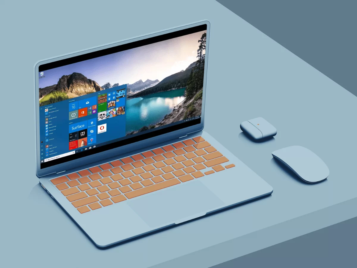 Blue laptop open on a table, screen showing customized windows display.