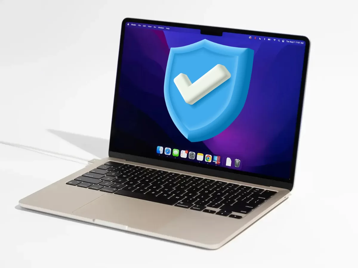 Macbook with antivirus symbol