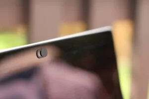 Close-up of a laptop webcam with a privacy cover slider, symbolizing online privacy and webcam security. 