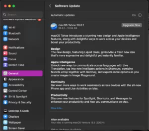 Screenshot of the macOS Software Update window showing an available update for macOS Tahoe 26.0.1. The description highlights new features including Liquid Glass design, Apple Intelligence, Continuity, and productivity improvements.